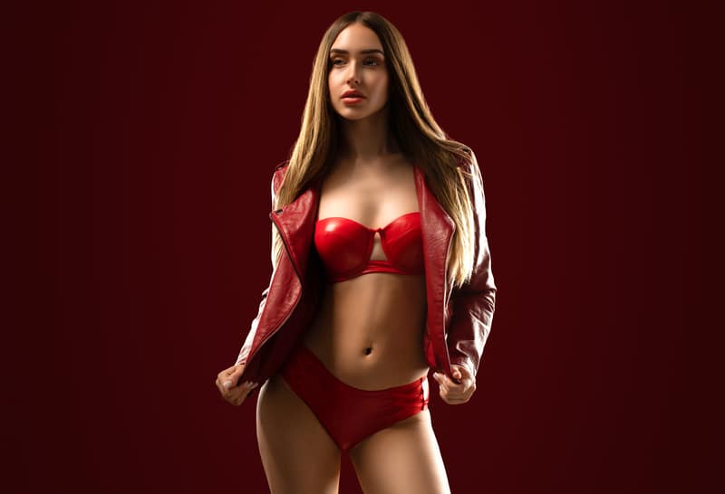 Female model in red latex